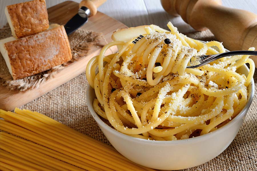 A preparation of Italian pasta with pecorino cheese